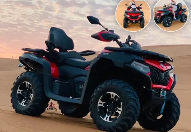 Sports quad 625cc ATV parked on a dune crest in Dubai