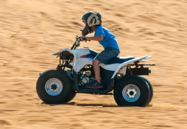 Yamaha 90cc kids quad bike on a supervised track in the Dubai desert